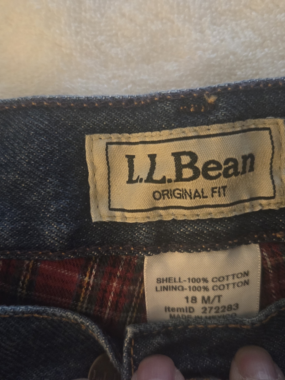 L.L. Bean Womenโs Relaxed Jeans - Dark Blue Denim with Red Plaid Lining